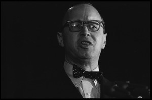 Arthur M. Schlesinger, Jr., speaking at the National Teach-in on the Vietnam War: close-up portrait, standing at the podium