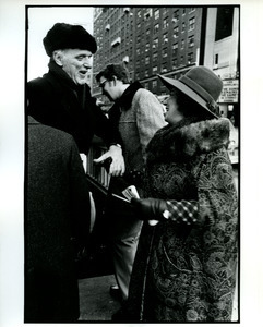 Bella Abzug talking with supporter