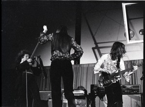 Unidentified band in performance in what appears to be a high school gymnasium