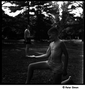Camp Arcadia: trick photo of camper 'holding' a weightlifter in the palm of his hand