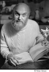 Ram Dass and dad at mum's: Ram Dass holding an open book