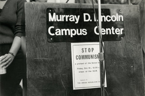 Handbill posted on podium reading 'Stop Communism / a protest of the Soviet Union / Sponsored by the UMass Republican Club,' UMass Amherst