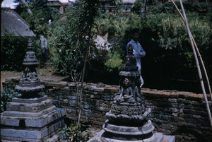 Buddhist shrines in walled garden