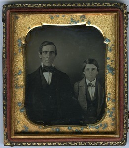 Rufus Scott and son Aaron: double half-length studio portrait, seated, facing camera