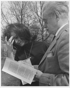 Hugh MacDiarmid, standing with a female student
