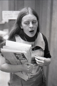 Bernadette Devlin McAliskey at the WBCN studios, holding copy of 'the people first'