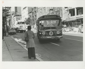 Woman waiting for bus