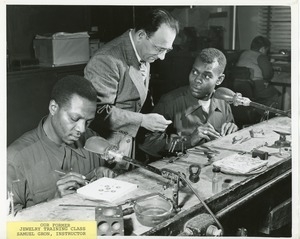 Samuel Gron instructing clients in a jewelry training class