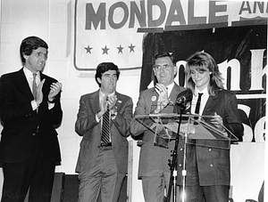 Mayor Raymond L. Flynn, Senator John F. Kerry and an unidentified man applauding a speaker at a John Kerry campaign event