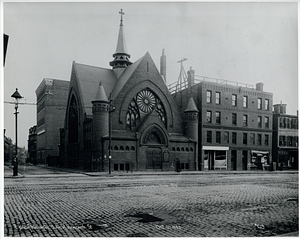 East side of Washington Street, south corner of Newcomb Street