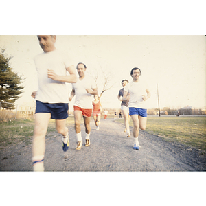 Men jogging on an outdoor track