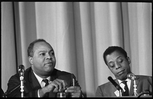 James Farmer (left) and James Baldwin as part of a panel at the Youth, Non-Violence, and Social Change conference, Howard University