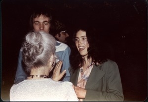 Andy Baer and Patti Smith conversing with Roberta Meyer (?)