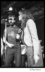 Bonnie Raitt and Keith Knudsen (Doobie Brothers), singing in the studio in association with the Musicians United for Safe Energy concert