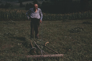 Orašac villager and farm tools