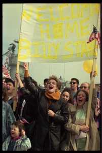 Ecstatic family with banner 'Welcome home Billy Stare,' as the USS Roberts returns from Persian Gulf War duty