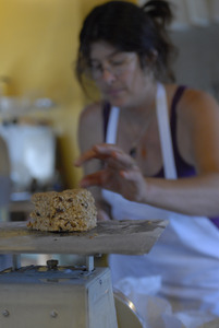 Hungry Ghost Bread: owner and baker Cheryl Maffei weighing goods