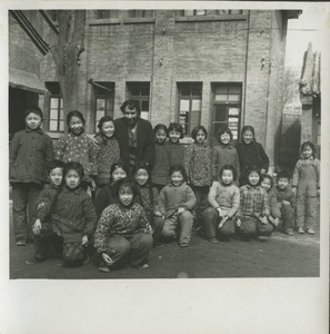 Shirley Graham Du Bois with school children in China