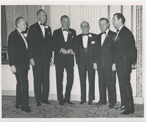 Unidentified men in tuxedos at an ICD event