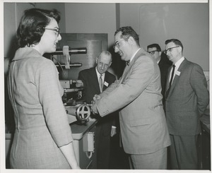 Attendees at a joint meeting of the American society of tool engineers and ICD touring a workshop