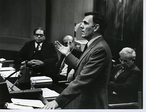 Profile view of Mayor Raymond L. Flynn speaking to an unidentified group at the Harvard School of Public Health