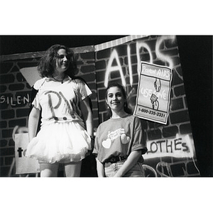 Two female cast members performing a scene from "Lessons from the Heart."