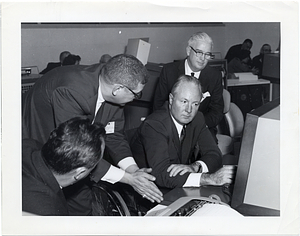 Mayor John F. Collins at a computer terminal