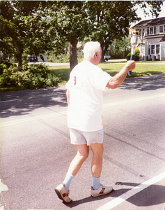 Manuel Coutinho carrying symbolic Olympic Torch