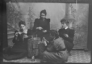Marie Høeg and Three Unknown People Drinking and Playing Cards
