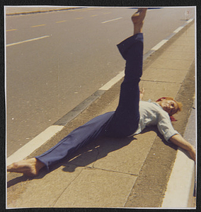 Kewpie Lying on a Sidewalk