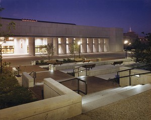 O'Neill Library exterior at night from stairway leading to plaza