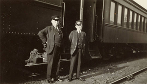 Frank W. Logan beside last passenger train to run on the Watertown branch