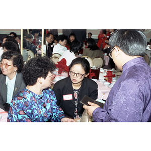 Guests mingle at the Chinese Progressive Association's 15th Anniversary Celebration