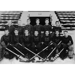 The hockey players pose for a team photo