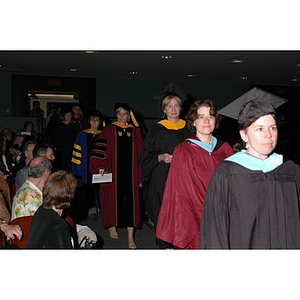 Faculty members proceed into School of Nursing convocation