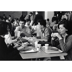 Students eating in new Ell Student Center addition