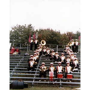 Members of the marching band forming an "N" in the stands