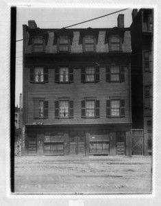 View of a building with a barbershop on the first floor