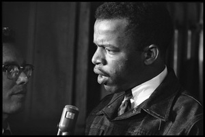 John Lewis interviewed by a reporter at the Youth, Non-Violence, and Social Change conference, Howard University