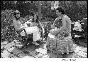 Ram Dass retreat at David McClelland's: group sitting in the garden and talking