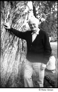 Ram Dass retreat in New Hampshire: George Alpert posting against a tree