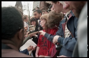 Scene outside the Hampshire County courthouse following acquittal in the CIA protest trial: Amy Carter being interviewed by the press