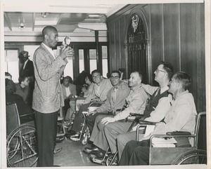 Wheelchair users being photographed