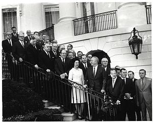 Vice President Hubert Humphrey, First Lady Lady Bird Johnson, Mayor John F. Collins, and group of unidentified men at meeting of United States Conference of Mayors in Washington D.C.