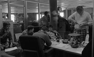 Unidentified officers in Boston Police Dispatch Operations Center conference room