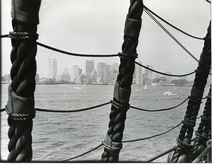 View of Boston Harbor through a ship's rigging