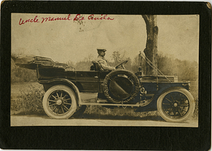 Manuel De Avila sitting in a car