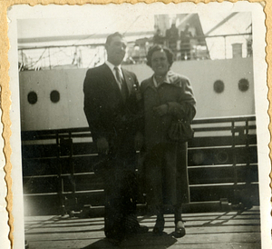 Antonio and Alzira Santos standing in front of ship