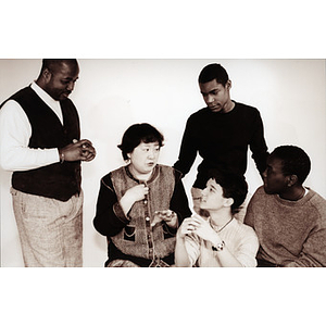 Five members of the youth troupe, "True Colors," in a production
