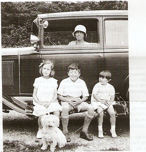 Ruth Sievwright and Dorothy, Ian and Annie sitting by car